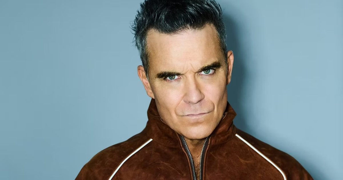 ROBBIE WILLIAMS RÉVÈLE LE DIAGNOSTIC DE L'AUTISME ET DIT QUE LA DÉCOUVERTE A AIDÉ À COMPRENDRE SON PROPRE CHEMIN